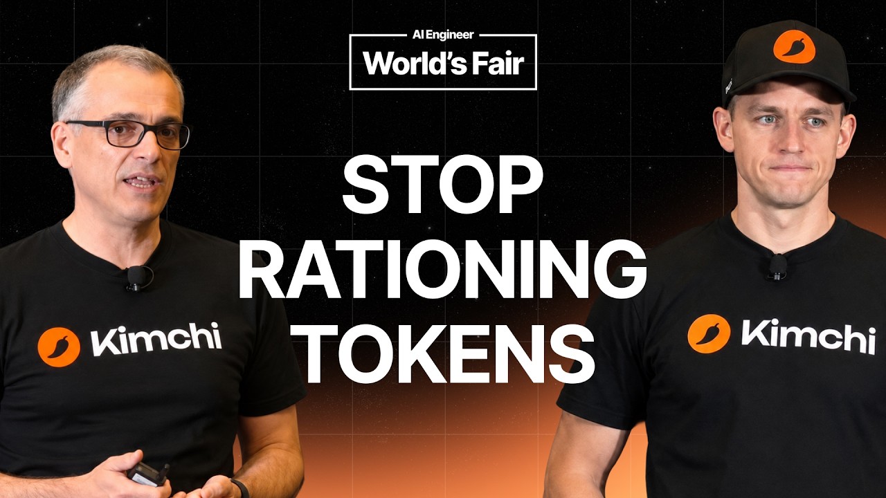 ภาพปกผู้บรรยายสองคนสวมเสื้อ Kimchi พร้อมข้อความ STOP RATIONING TOKENS